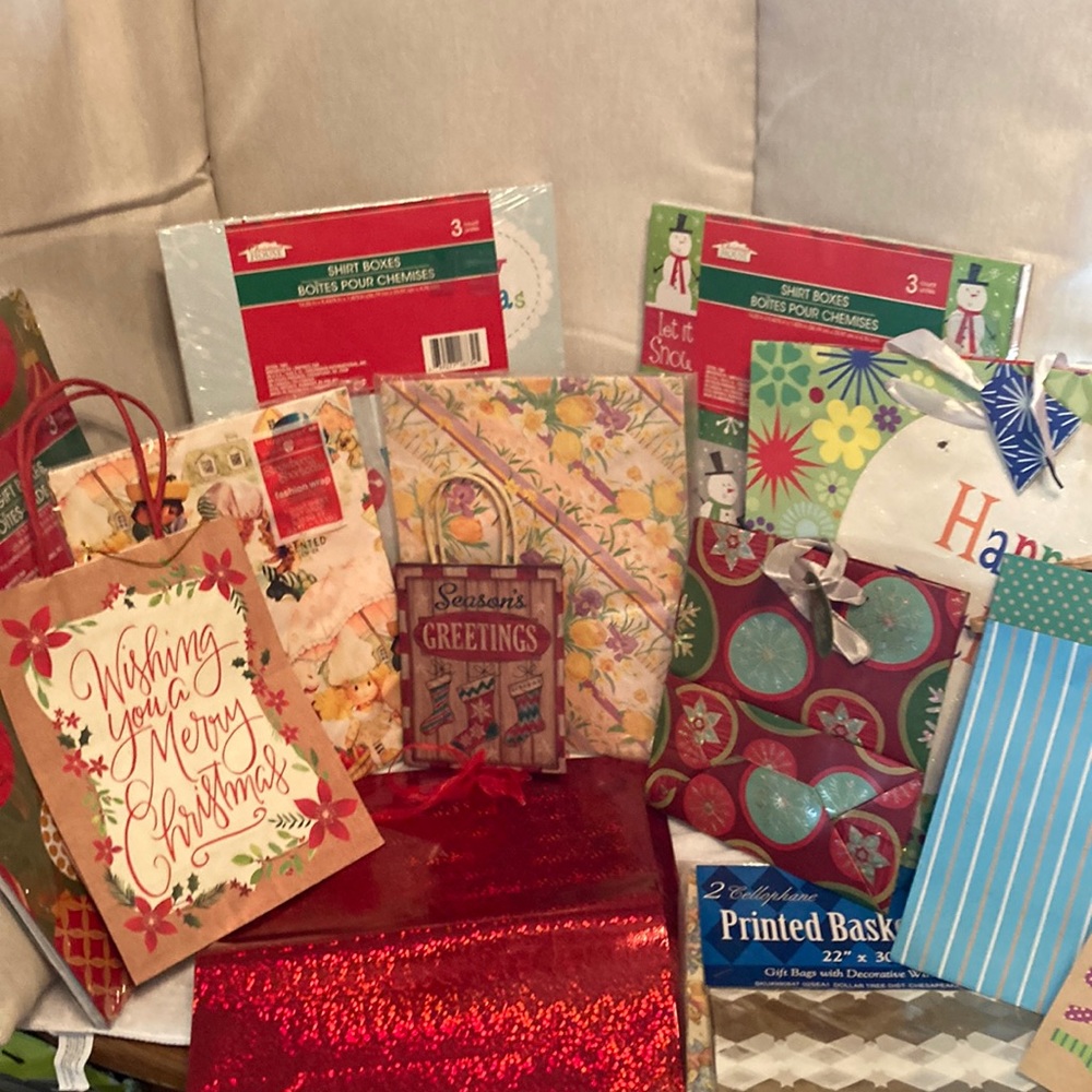 14 pieces of new unopened bags, wrapping paper,cardboard boxes In excellent cond